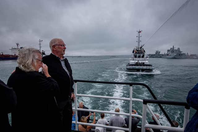 Pictured: Diane Weeks watching the Tug boats putting on a water jet display
Picture: Habibur Rahman