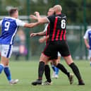 Tempers rise during Denmead's HPL Cup loss to Fleetlands - Keiran Hammond (left) and Jim Duffin. Picture: Chris Moorhouse