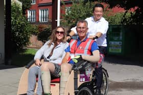 Alan Mak MP, Cycling Without Age volunteer co-ordinator Jenni Van Wijk and lead volunteer Roger Knight