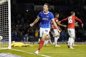 Conor Shaughnessy celebrates his late, late winner for Pompey against Wycombe. Pic: Jason Brown.