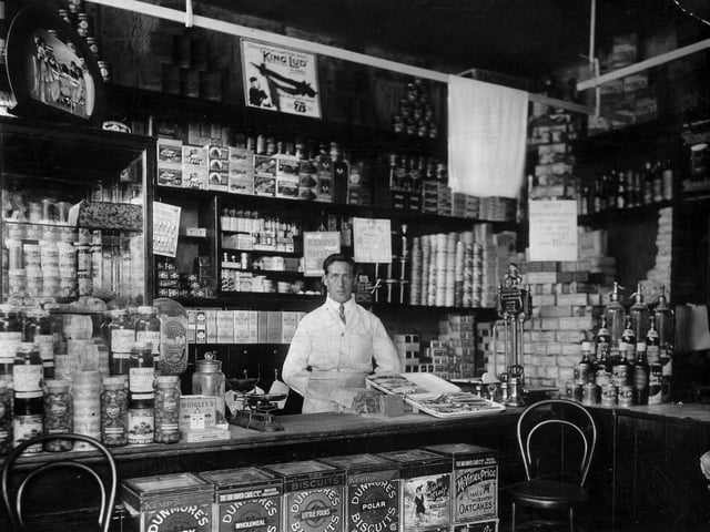 Horace Henry Plowman (1889-1959) is the shopkeeper in this view and was the owner of the grocery shop at 359 Forton Road, Gosport.