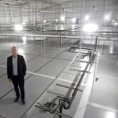 New rules are being issued to Portsmouth International Port on January 31 about checks which need to be made to items as a result of Brexit. Even after this new legislation, the use of the much-maligned Border Control Post is up in the air. Pictured is Mike Sellers, port director at Portsmouth International Port, in the roof space at Border Control Post. Picture: Sarah Standing (040722-1272).