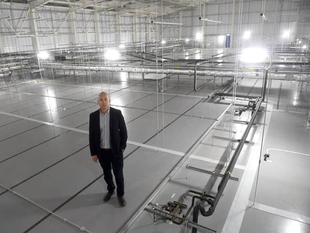 New rules are being issued to Portsmouth International Port on January 31 about checks which need to be made to items as a result of Brexit. Even after this new legislation, the use of the much-maligned Border Control Post is up in the air. Pictured is Mike Sellers, port director at Portsmouth International Port, in the roof space at Border Control Post. Picture: Sarah Standing (040722-1272).