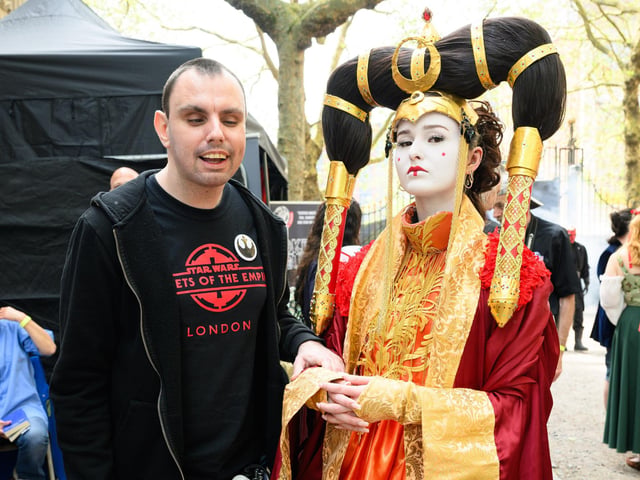 Aaron Danvers-Jukes who is totally blind with Padmé Amidala. Aaron  is able to build up a much better understanding of the costumes through touch. Picture: Keith Woodland (110521-110)