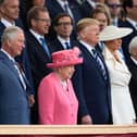 President of the United States, Donald Trump and First Lady of the United States, Melania Trump stand next to Theresa May, Prince Charles, Prince of Wales, Queen Elizabeth II