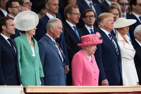 President of the United States, Donald Trump and First Lady of the United States, Melania Trump stand next to Theresa May, Prince Charles, Prince of Wales, Queen Elizabeth II