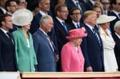 President of the United States, Donald Trump and First Lady of the United States, Melania Trump stand next to Theresa May, Prince Charles, Prince of Wales, Queen Elizabeth II