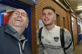 Former Pompey forward George Hirst poses for a picture with a fan before his final game for the Blues at Sheffield Wednesday last April.