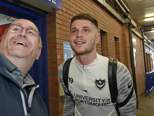 Former Pompey forward George Hirst poses for a picture with a fan before his final game for the Blues at Sheffield Wednesday last April.