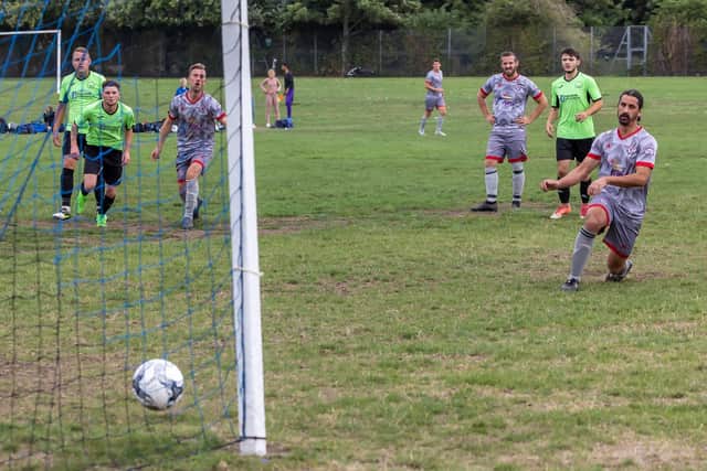 Gosham Rangers convert a penalty during their 4-3 Division 2 win against AFC Bedhampton Village. Picture: Mike Cooter