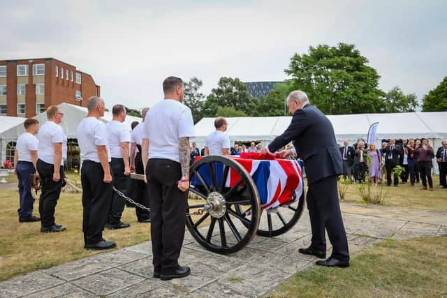 At 4pm on Saturday afternoon, a Royal Navy Field Gun with a Union flag draped over carried the RNA memorial wreath from HMS Nelson Wardroom to the Falklands Memorial, Sally Port, Old Portsmouth, via Gunwharf Quays. Pictured - The wreath was placed by Admiral of the Royal Navy Alan West (Retired). Picture: Alex Shute.