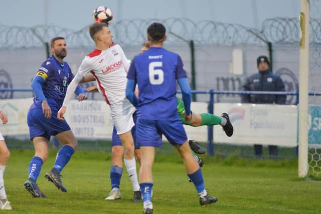 Harry Jackson (white) on the attack for Horndean at Baffins. Picture by Martyn White