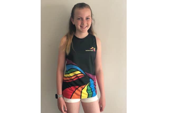 Elysia Wilson, 13, won Sarisbury Sparks Netball Club's t-shirt competition to raise funds for the NHS