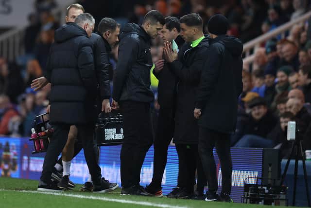John Mousinho speaks to the fourth official today. (Photo by Catherine Ivill/Getty Images)