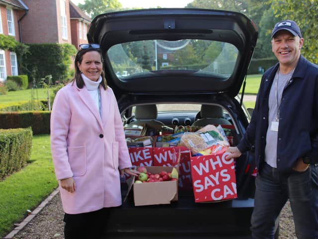 Highfield head Suzannah Cryer and her husband Bob load up the goodies headed for Liphook Day Centre.