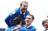 Jack Whatmough celebrates with his team-mates. Picture: Joe Pepler