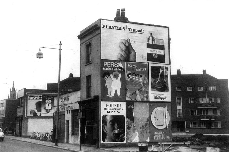 Amazing old advertisements on the wall. Post Office Commercial Road, May 1964