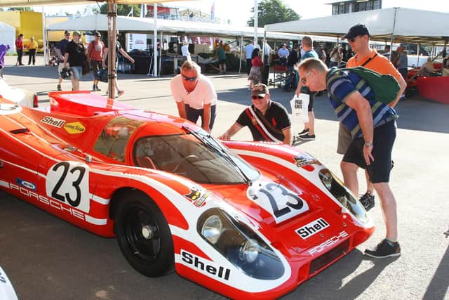 Festival of Speed 2019 in Chichester. Visitors admire one of the cars. Photo by Derek Martin Photography.