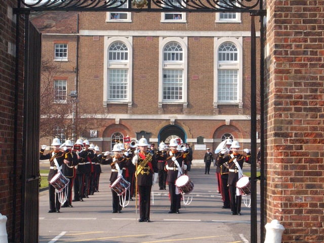 The Royal Marines Band playing outside the Quadrangle Building during a royal visit