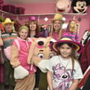 The Pink Party Shop in Stakes Hill Road, Waterlooville, are selling off 2000 fancy dress costumes as it condenses the business transforming it into a party balloon business.Pictured is: (l-r) Byron Evans (8), Gemma Evans, Robyn Evans (6 months old), Bruce Parry, Molly Parry (11), Lynda Parry, Lana Baynton and Edie Parry (9) who have run The Pink Party Shop for generations.Picture: Sarah Standing