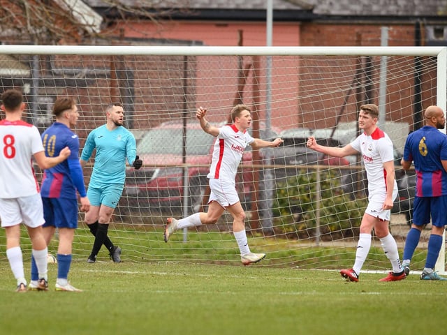 Zack Willett has just headed Horndean in front. Picture: Keith Woodland