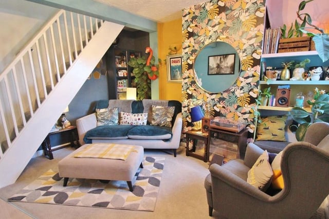 This colourful home is on the market for £232,500 and it would be ideal for a first time buyer.