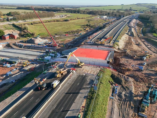 Pictured:  The large concrete structure, which is creating the underpass, has been pushed into the hole on the M27.