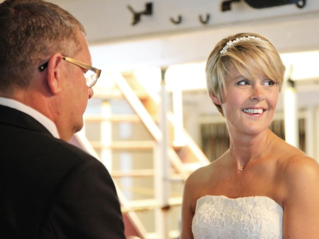 Saying their vows on the lower deck of HMS Warrior in 2015