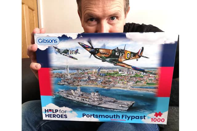 Artist Matthew Emeny has created a painting to commemorate D-Day 80, showing a pair of Spitfires flying past HMS Queen Elizabeth leaving Portsmouth.He is selling the original in a silent auction to raise money for the armed forces charity, Help For Heroes. It has also been turned into a 1,000-piece puzzle.