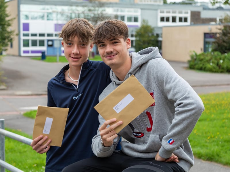 Buddies Josh Lumsden (16) and Bailey Rand (16) with the GCSE results at Havant Academy. Picture: Mike Cooter (240823)