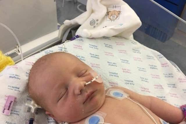Hunter while he was in hospital shortly after he was born.