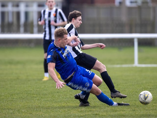 Hayling United (black/white) v Clanfield. Picture by Alex Shute