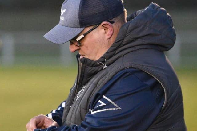 Bosham boss Tony Hancock has brought Ashley Harris back into football.