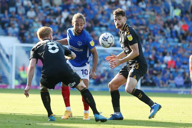 Marcus Harness attempts to inspire Pompey in their 2-1 defeat against Cambridge United. Picture: Joe Pepler