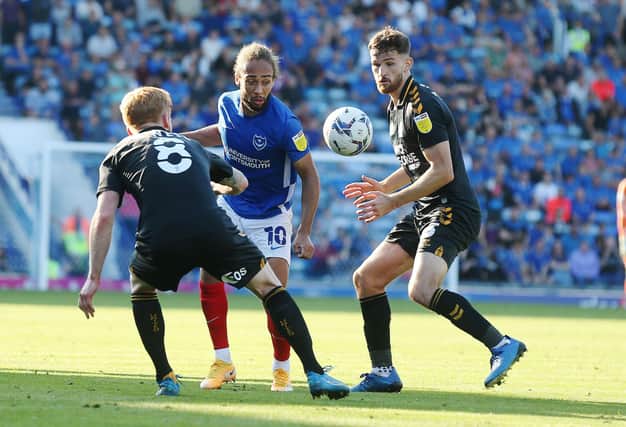 Marcus Harness attempts to inspire Pompey in their 2-1 defeat against Cambridge United. Picture: Joe Pepler