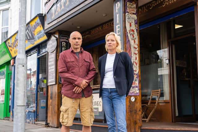 Kerry Hutton, 45, and Michael Hassanyeh 56, outside their studio Chilli Tattoo. Photo by Matthew Clark