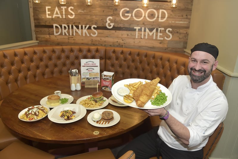 Clarence Pier Brewers Fayre officially reopened on February 6, 2023. 
Pictured: Pete Hookey, kitchen manager with some of the dishes available.
Picture: Sarah Standing