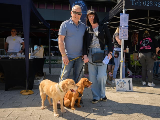 Patrick and Theresa Stormont with their dogs, Bailey and IndyPicture: Keith Woodland (250521-10)