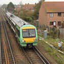 A tribunal has ruled that a Network Rail track inspector based in Havant suffered an unfair dismissal over his 'shy bladder syndrome'. Picture is a Southern Rail train.