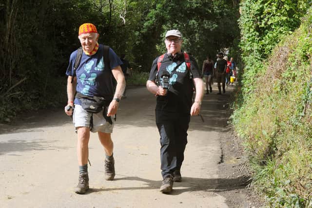 Former Radio 1 controller and Radio 4 presenter Matthew Bannister setting off from Wickham Festival on Friday, August 4 and will be walking 180 milles in two weeks to FolkEast Festival in Suffolk as part of Folk on Foot's biggest walk yet and raising money for Help Musicians charity.

Pictured is: (right) Matthew Bannister.

Picture: Sarah Standing (040823-314)