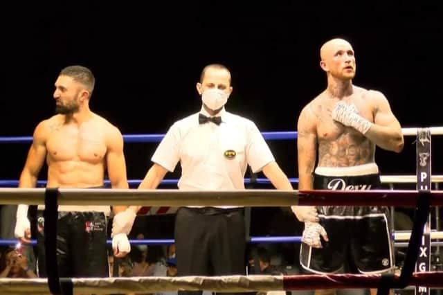 Portsmouth's Harley Hodgetts, right, is about to have his arm raised in his latest fight in Italy