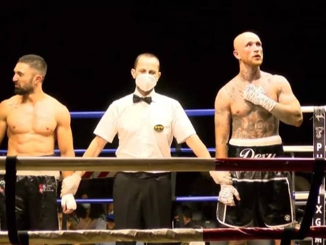 Portsmouth's Harley Hodgetts, right, is about to have his arm raised in his latest fight in Italy