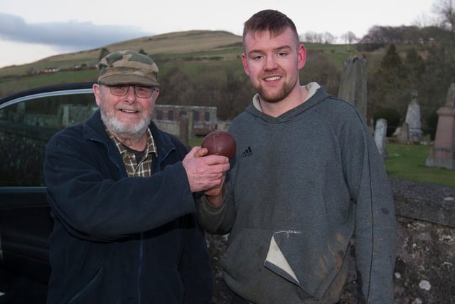 Robbie Linton won his Ba' helped by Brian Kelly who drove him away in his car. Photo: Bill McBurnie.