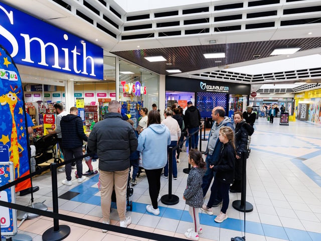Families queued ahead of the opening of the store with the first 50 children receiving goodie bags.