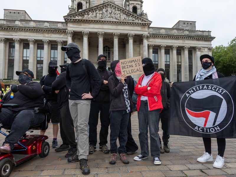 A group of anti-fascists had heated exchanges with anti illegal immigration protestors.