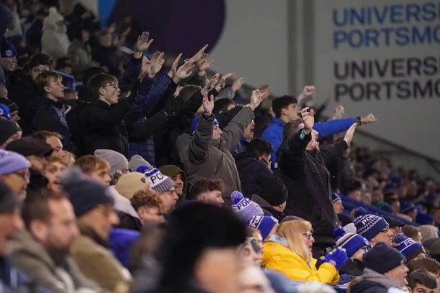 Pompey fans backed their team to a crucial Championship survival win over Cardiff last night.
