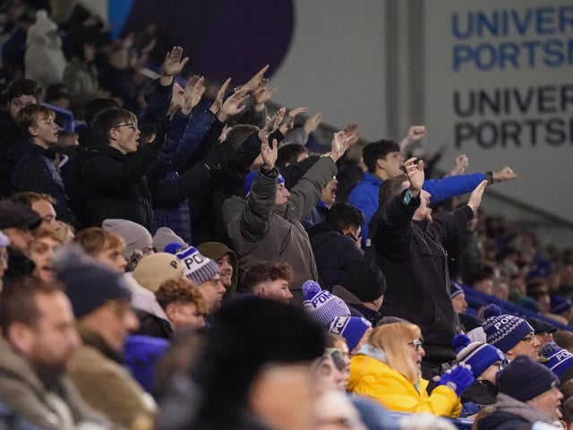 Pompey fans backed their team to a crucial Championship survival win over Cardiff last night.