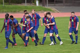 US Portsmouth players celebrate Joe Johnson's winner against Portland. Picture: Neil Marshall