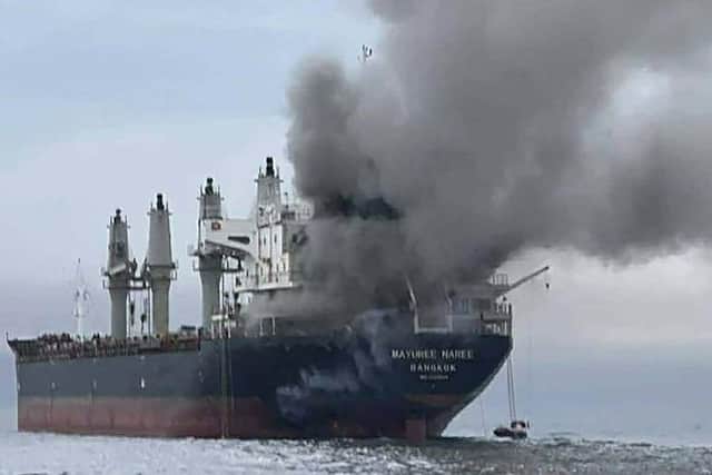 UK and US experts are discussing how to reopen the Strait of Hormuz amid the ongoing war in Iran. Pictured:   Thai bulk carrier 'Mayuree Naree' near the Strait of Hormuz after an attack.