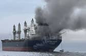 UK and US experts are discussing how to reopen the Strait of Hormuz amid the ongoing war in Iran. Pictured:   Thai bulk carrier 'Mayuree Naree' near the Strait of Hormuz after an attack.